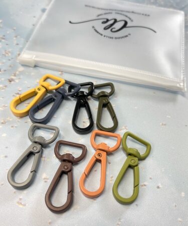 IL NEGOZIO DELLA MAMMA DI CLE - LE ATTREZZATURE DELLA CLE - GANCI CHIUSURE TONDE 8 colori