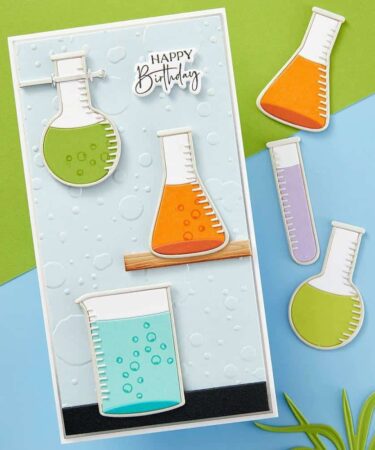 Alternative view of SPELLBINDERS - Laboratory Glassware Etched Dies